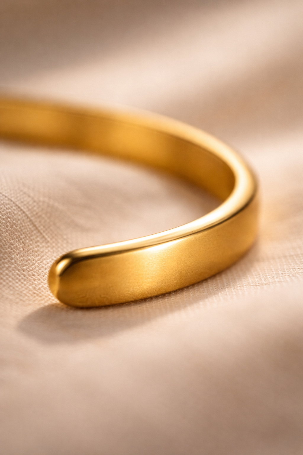 Close-up of The Luna Cuff gold surface
